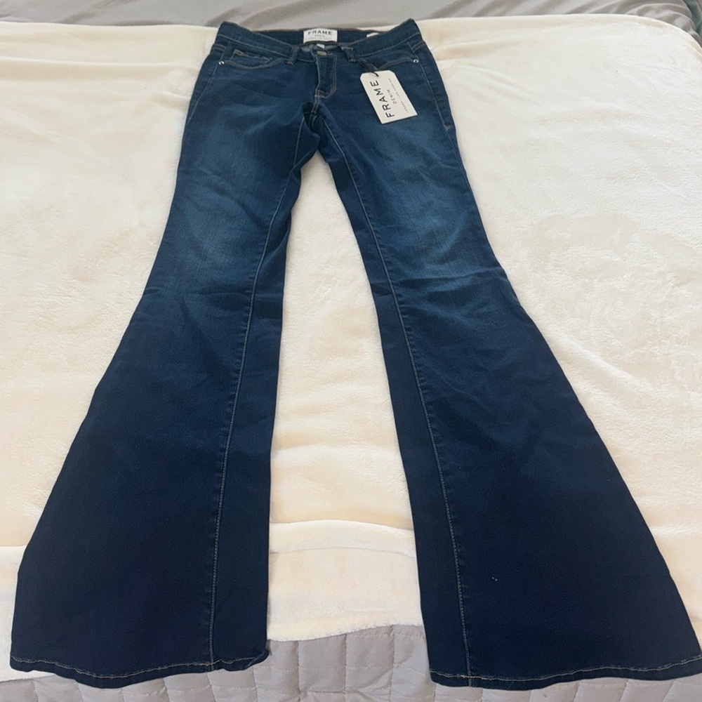 Frame Le Skinny Flare dark wash denim. Fabric is soft with slight stretch.
